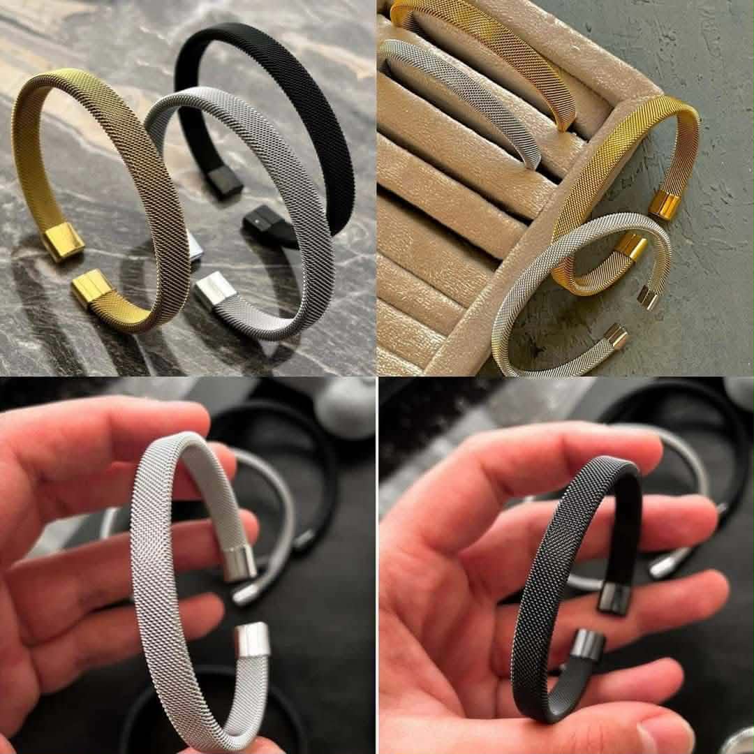received_2732240110565930 Trendy Stainless Steel Magnetic Cuff Bracelet for Men & Women - Image 1